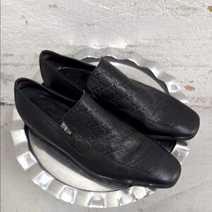 Gucci Embossed Black Leather Men's Slip-Ons